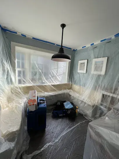 Room wrapped in plastic containment during a water damage dry-out in Union, NJ