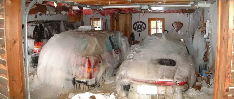 Garage coated in ice after a frozen pipe burst during a hard freeze near Union, NJ
